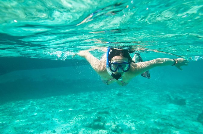 Cades Reef Snorkel Cruise from St. John's Antigua - Lunch on a white sand beach, plus drinks that keep the mood light