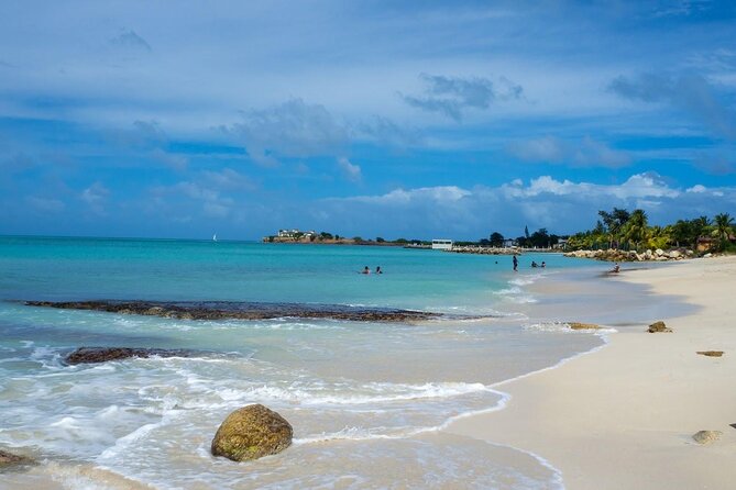 Famous Red Phone Booth Beach (Dickenson Bay) and Fort Bay Beach - Fort James and Fort Bay Beach: Sand, Swim, and a Place That Used to Defend the Island