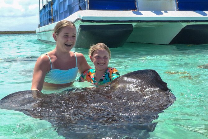 Stingray City Antigua for all the ages - ROUND TRIP INCLUDED - In the Water at Stingray City, Feeding, Touching, and Staying Safe
